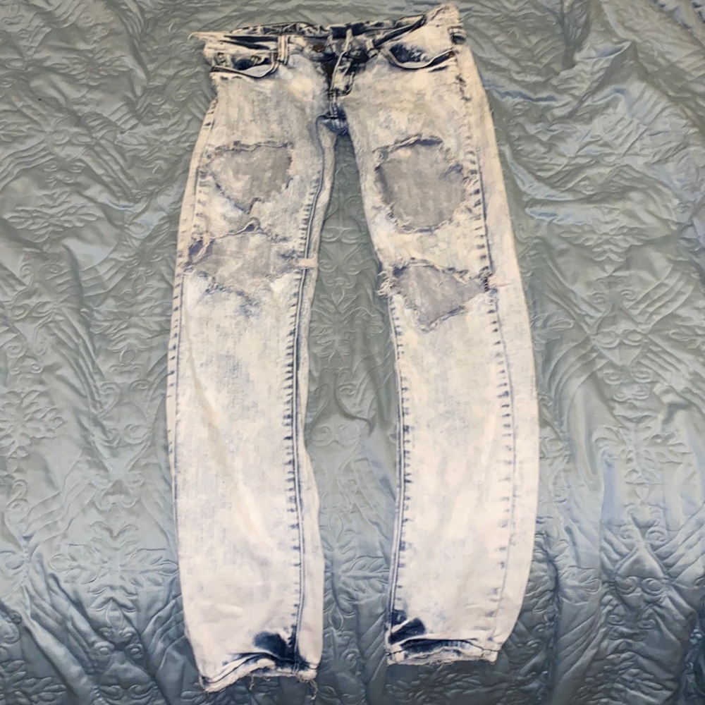 Bleached distressed ripped jeans